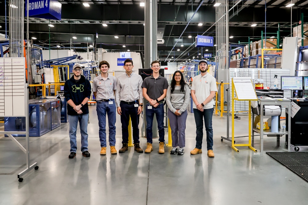 Group picture of six Viwinco interns, standing in the Viwinco New Glass Facility